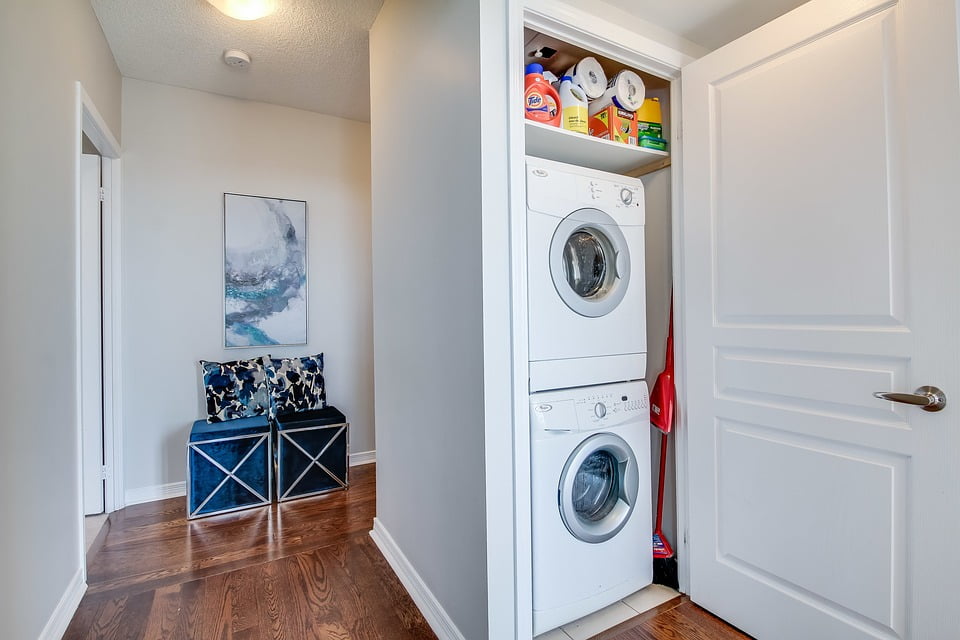 Clean and Organized Laundry Room with Washer and Dryer